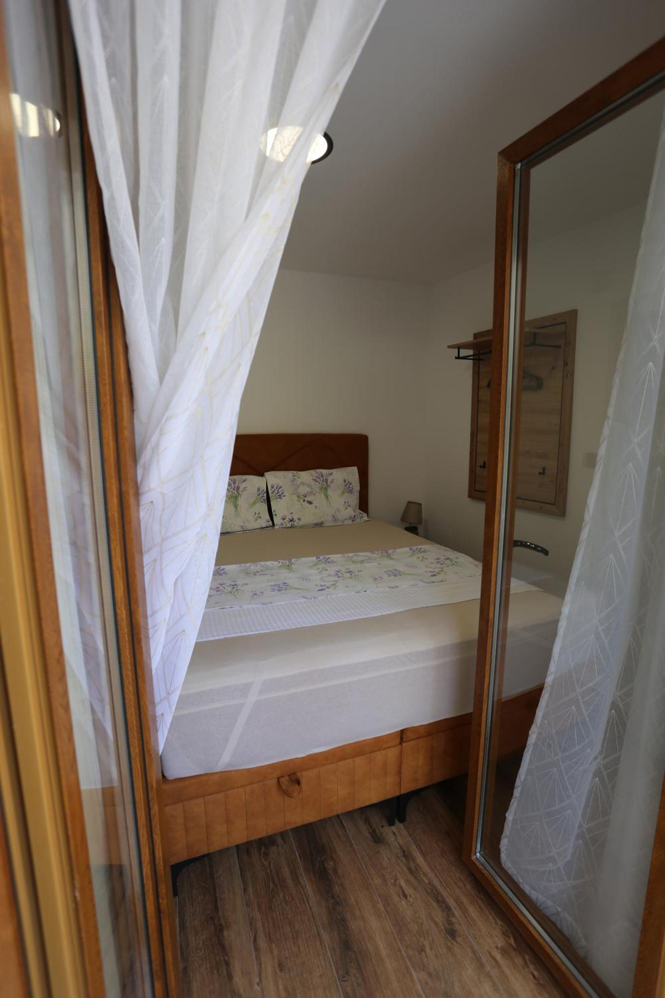 Queen Of Peace Apartment Split